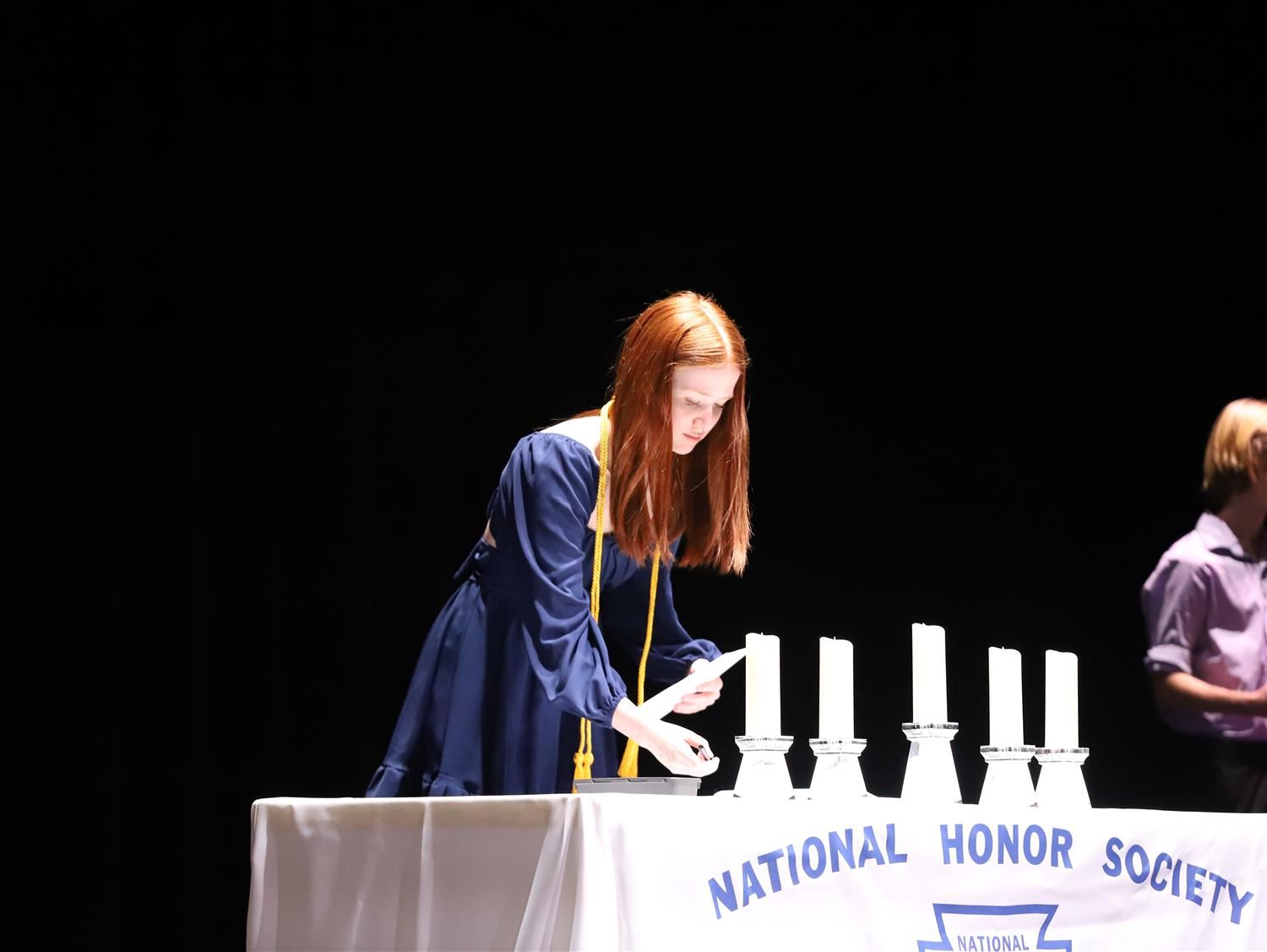 GISH student signing the NHS induction book.